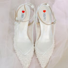 white pointy elegant transparent heel.