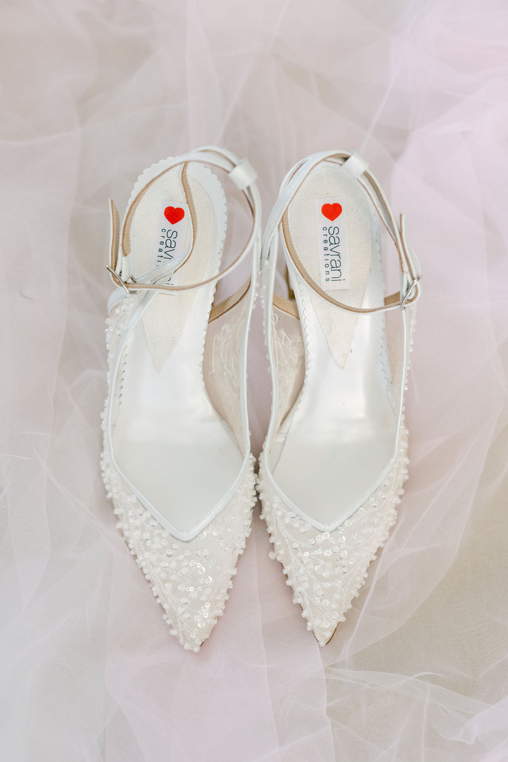 white pointy elegant transparent heel.